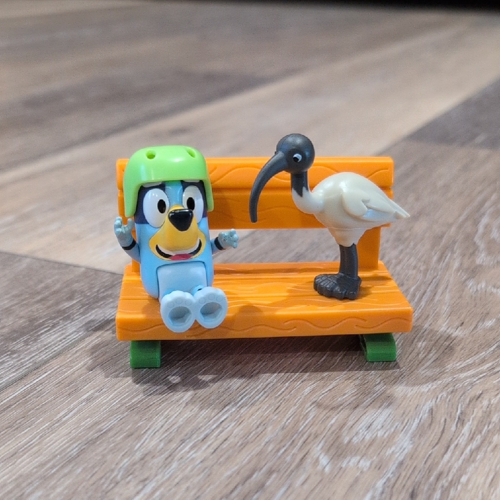 Bird Toy with Orange Bench and Green Accents